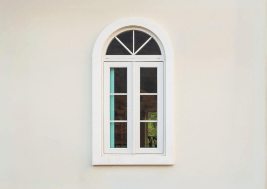 Porte-fenêtre cintrée PVC